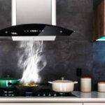 Hindware Nevio 60 Auto Clean Chimney hanging on the kitchen wall